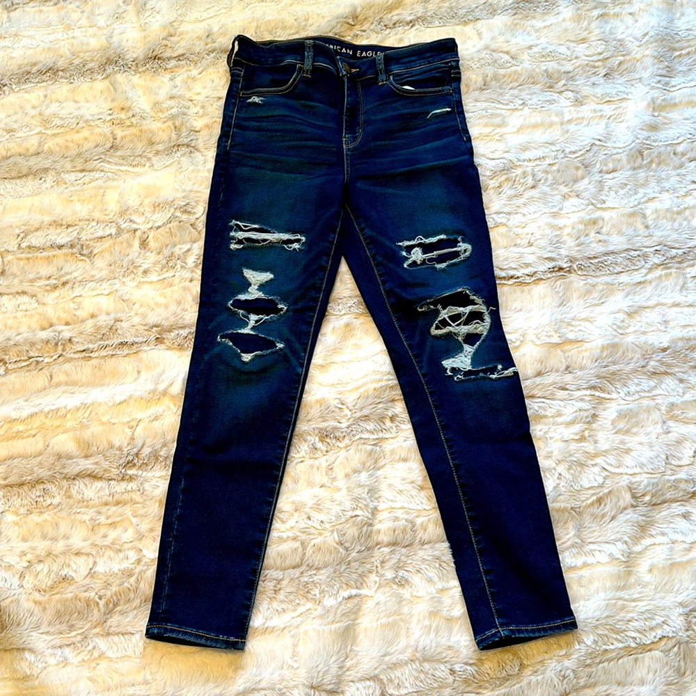 Faux ripped skinny jeans